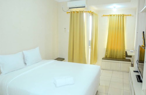 Panunggangan Utara Apartment | Simply Studio Room at Grand Serpong Apartment By Travelio