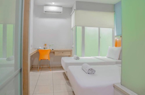Bendungan Hilir Hotel | LeGreen Suite Poso