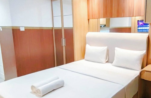 Biringkanya Apartment | Wooden Touch Studio At Tamansari Skylounge Makassar Apartment