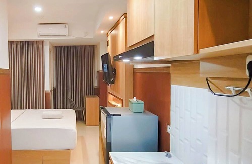 Biringkanya Apartment | Wooden Touch Studio At Tamansari Skylounge Makassar Apartment