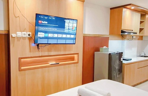 Biringkanya Apartment | Wooden Touch Studio At Tamansari Skylounge Makassar Apartment