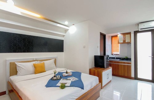 Kebagusan Apartment | Wooden Touch Studio At Kebagusan City Apartment