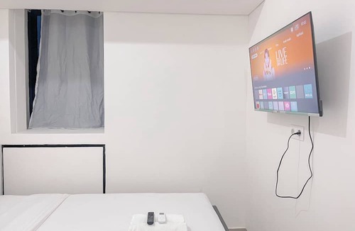Makassar Apartment | Combined White Style 1Br (No Kitchen) Apartment Bandaraya - Tallasa City Makassar