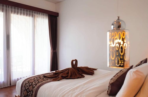 Songan Hotel | Pinggan Skyline