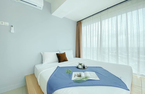 Pekayon Jaya Apartment | Comfort And Spacious 2Br Grand Kamala Lagoon Apartment