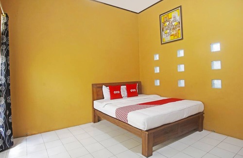 Kalianda Hotel | OYO 90229 Fidel Caestro Homestay