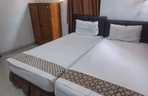 Purwokerto Hotel | Capital O 93872 Natura Guest House Syariah Near alun alun kota purwokerto