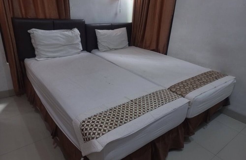 Purwokerto Hotel | Capital O 93872 Natura Guest House Syariah Near alun alun kota purwokerto