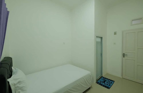 Palopo Hotel | Hotel O Qq Kost Near Pantai Kebesaran Beach
