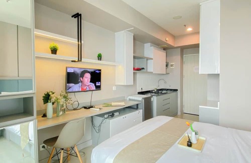 Pekayon Jaya Apartment | Restful Stay In Studio Room At Apartment Grand Kamala Lagoon