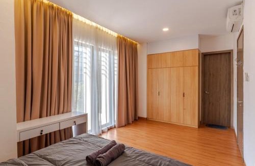 Lubuk Baja House | Kyzen - Modern 4BR Family Home w Private Garden