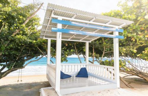 Langowan Resort | De BOUGENVILLE Tulap Beach Front