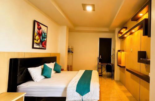 Langowan Resort | De BOUGENVILLE Tulap Beach Front