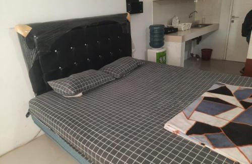 Karawang Hotel | Hotel O Apartemen Grand Sentraland by Mira