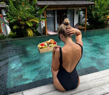 Beraban Hotel | EHOA NYANYI BEACH Boutique Hotel - In front of entrance to NUANU