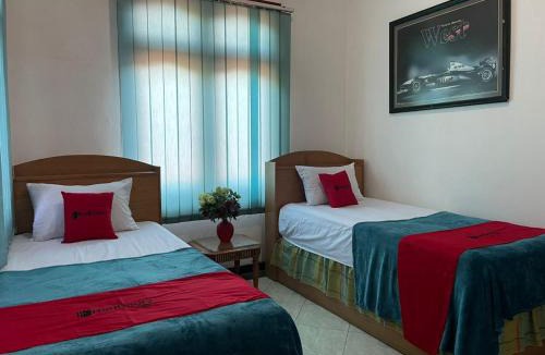 Surabaya Hotel | RedDoorz Syariah @ Karang Pilang