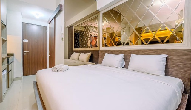 Warm And Minimalist Studio Room Transpark Cibubur Apartment in Bekasi