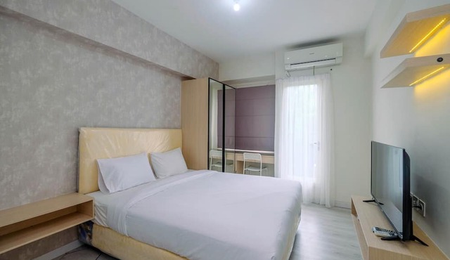 Comfy And Stylish Studio Podomoro Golf View Apartment By Travelio in Depok