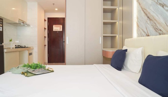 Bright And Homey Studio Room At Apartment Sky House Bsd in Balaraja