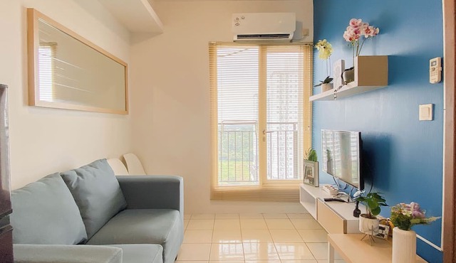 Cozy With Blue Accent 2Br At Podomoro Golf View Apartment in Gunung Putri