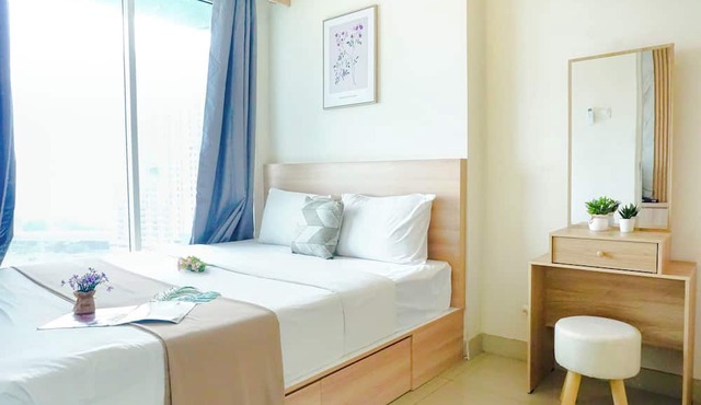 Homey White 2Br At Grand Kamala Lagoon Apartment in Bekasi
