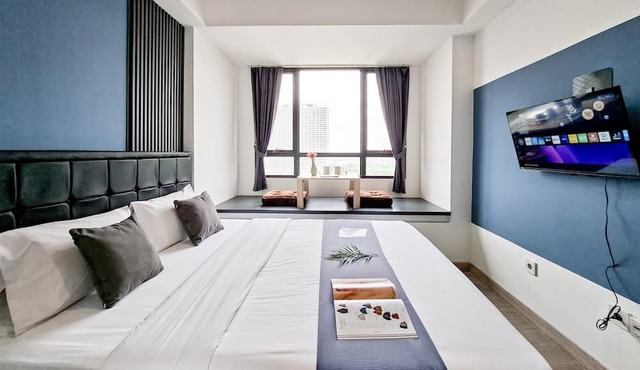 Blue Studio At Apartment Collins Boulevard in Tangerang