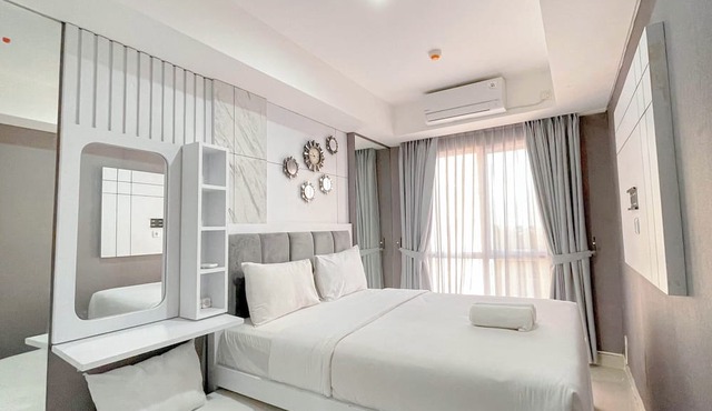 Grey Toned 1Br Apartment Tamansari Skylounge Makassar