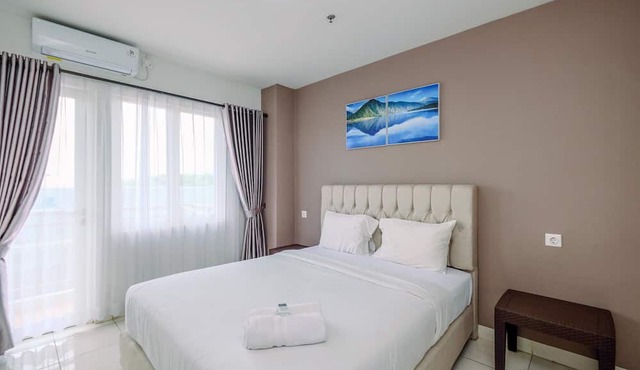 Comfort and Homey 2BR at Sentul Tower Apartment in Citaringgul