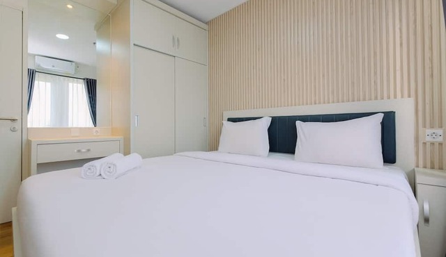 Restful and Modern 2BR at Sentul Tower Apartment in Citaringgul