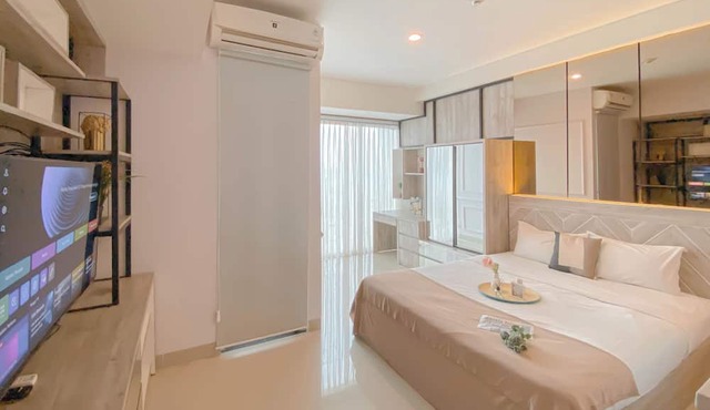 Homey and Restful Studio Grand Kamala Lagoon Apartment in Bekasi