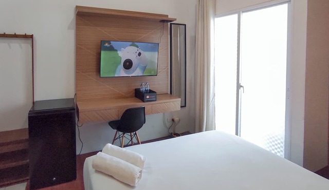 Homey Studio With Easy Pool Access Apartment At Suncity Residence in Sidoarjo