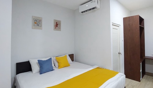 GoHome Harmoni Apartment
