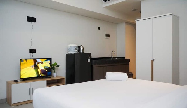 Studio Apartment With Sofa At Carstensz Residence in Gading Serpong