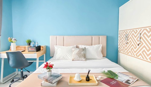 Neat Studio With Blue Toned Wall At Dramaga Tower Apartment in Dramaga