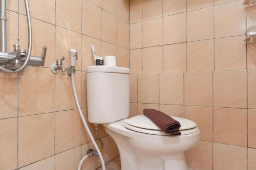 Combined and Spacious 3BR at Green Pramuka City Apartment By Travelio