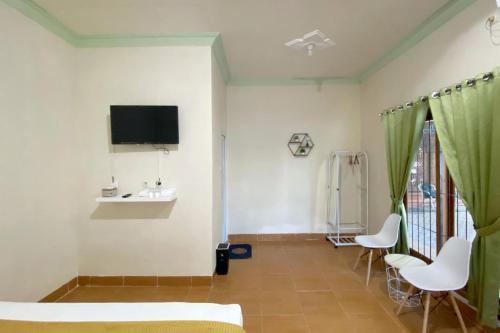 Adipura Guesthouse Syariah Mitra RedDoorz near Terminal Nganjuk in Nganjuk
